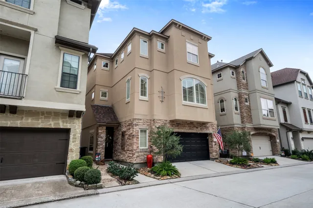 a view of a building with a garden