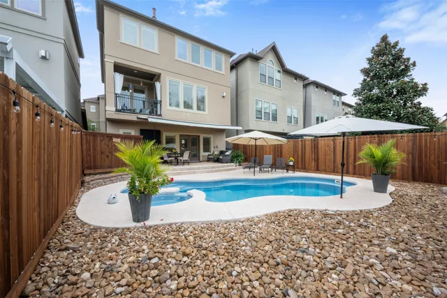 a house view with a garden space