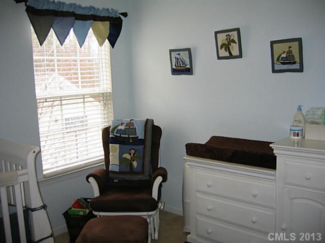 10410 Caldwell Depot Road Cornelius, NC 28031 - Photo 13 of 15 a view of a workspace with furniture and a window