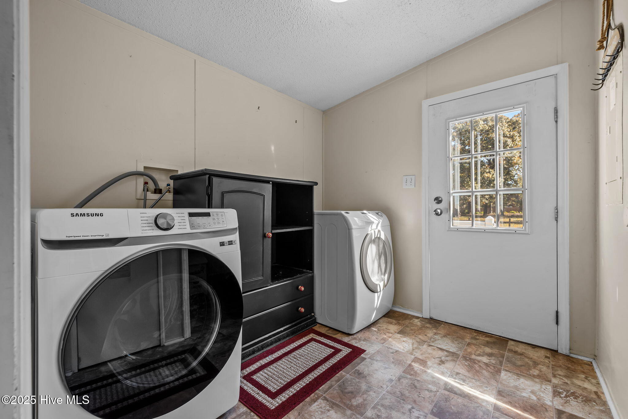758 Wetherington Landing Road Stella, NC 28582 - Photo 19 of 49 Laundry room