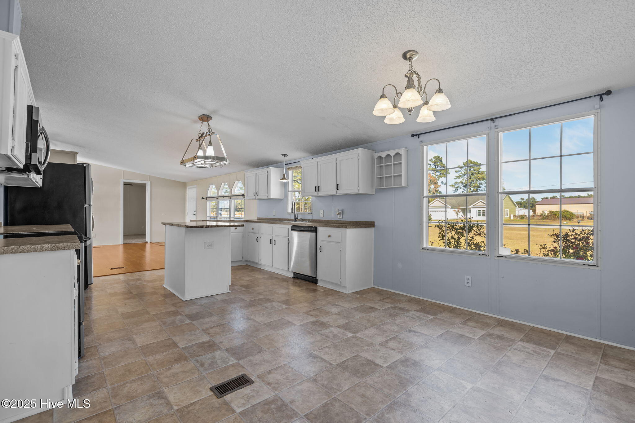 758 Wetherington Landing Road Stella, NC 28582 - Photo 39 of 49 Dining to kitchen