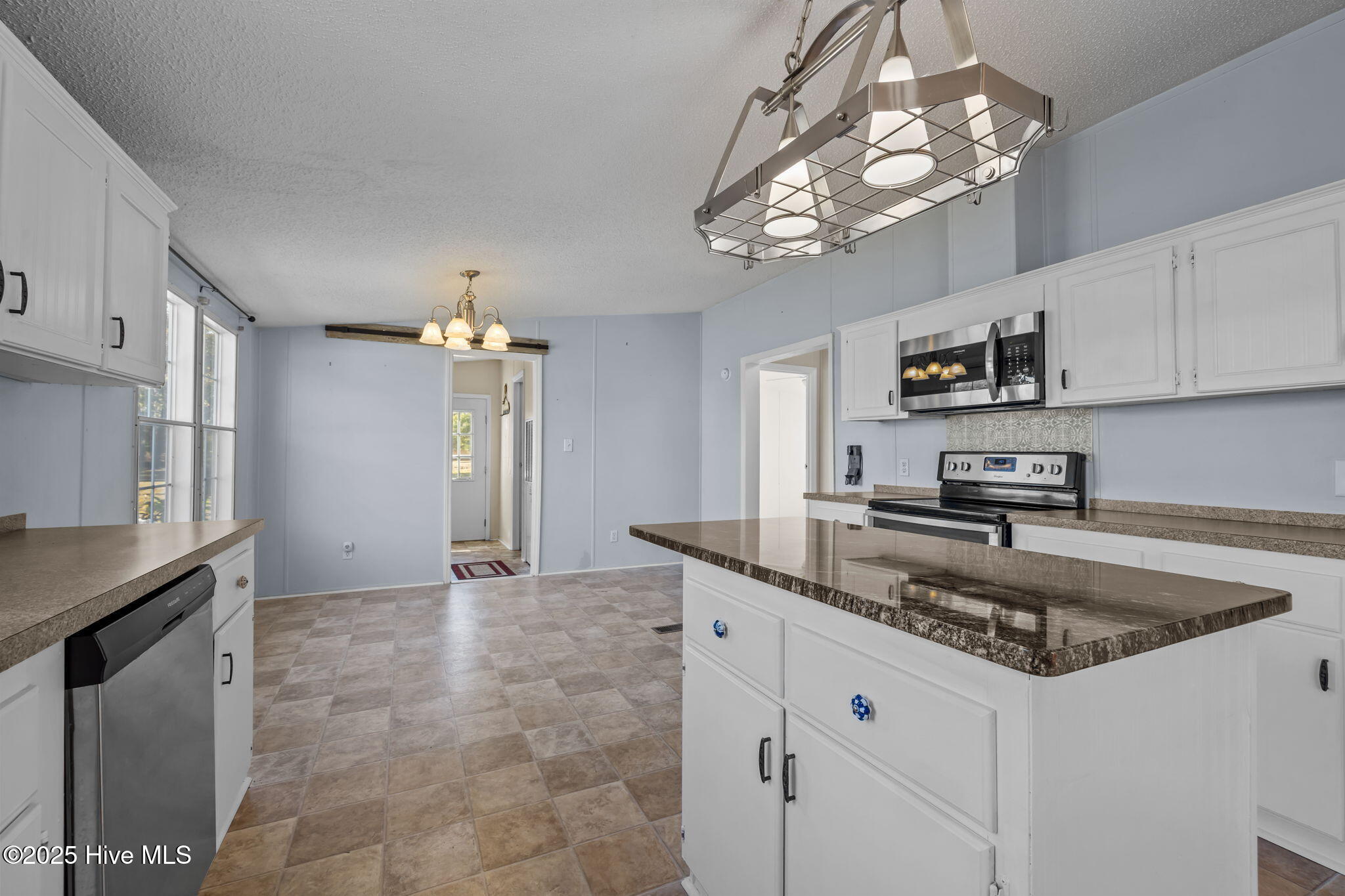 758 Wetherington Landing Road Stella, NC 28582 - Photo 42 of 49 Kitchen w/ island