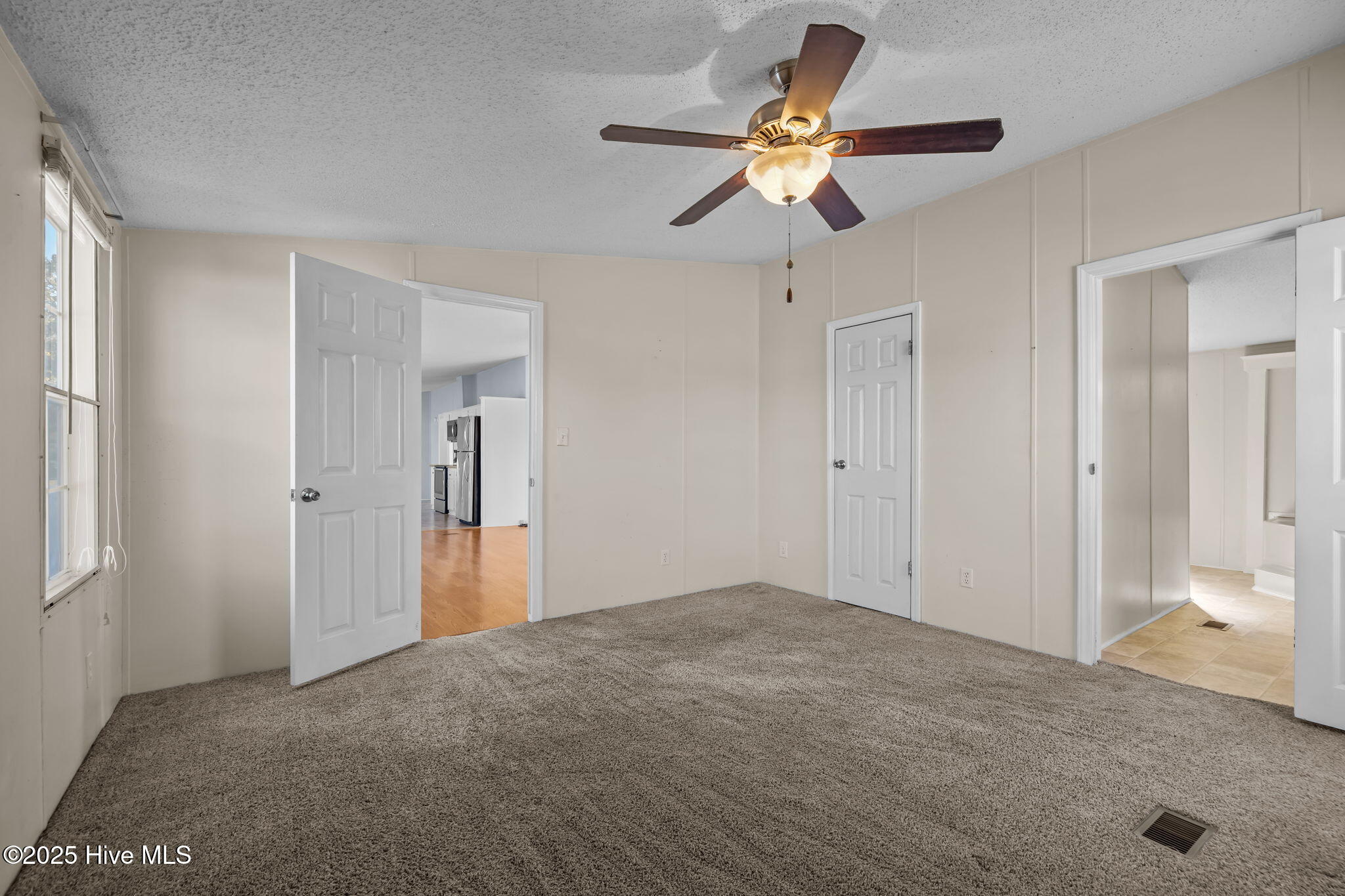 758 Wetherington Landing Road Stella, NC 28582 - Photo 46 of 49 Primary bedroom