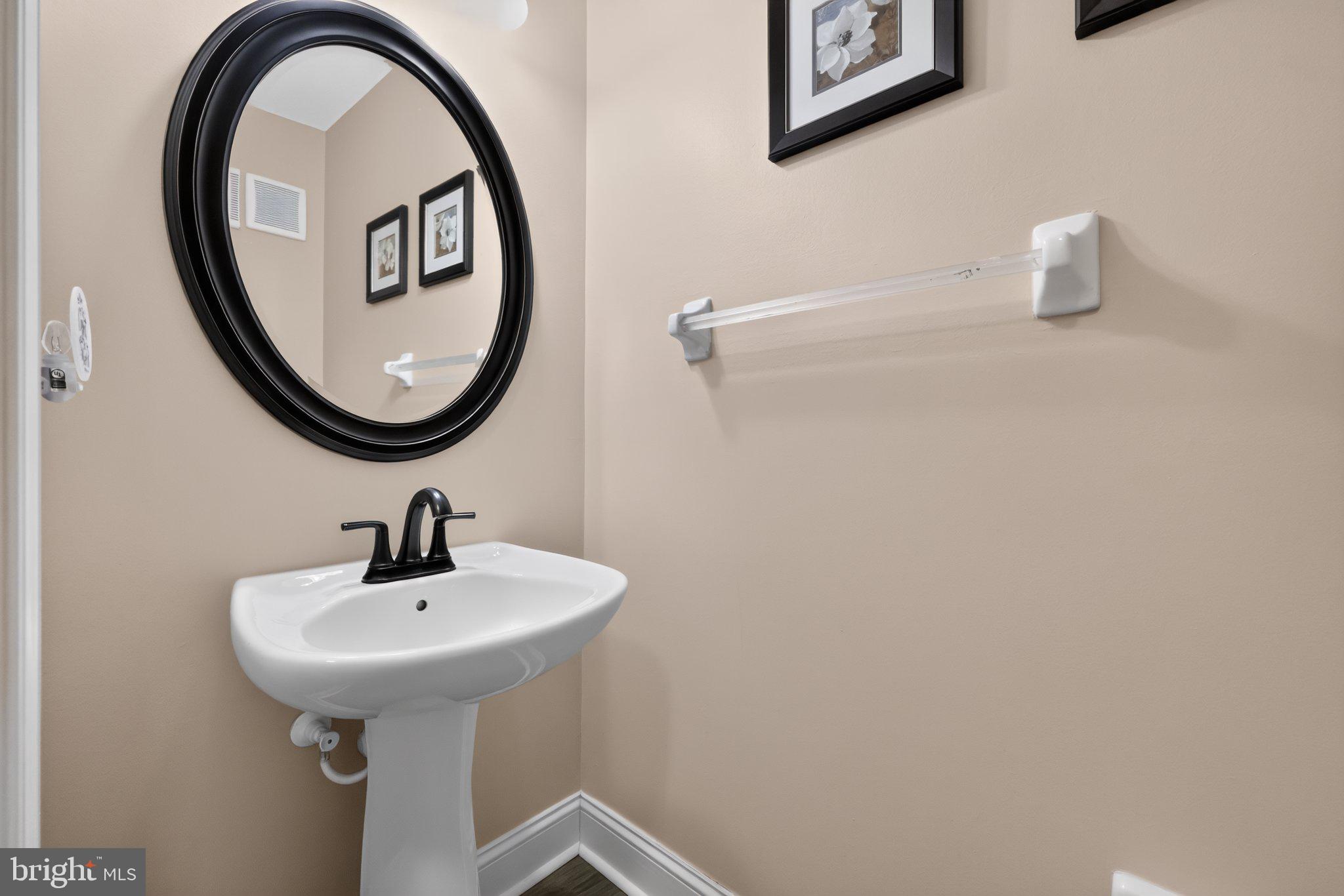 4105 Buxmont Road Marlton, NJ 08053 - Photo 8 of 18 Elegant half-bath with modern accents.