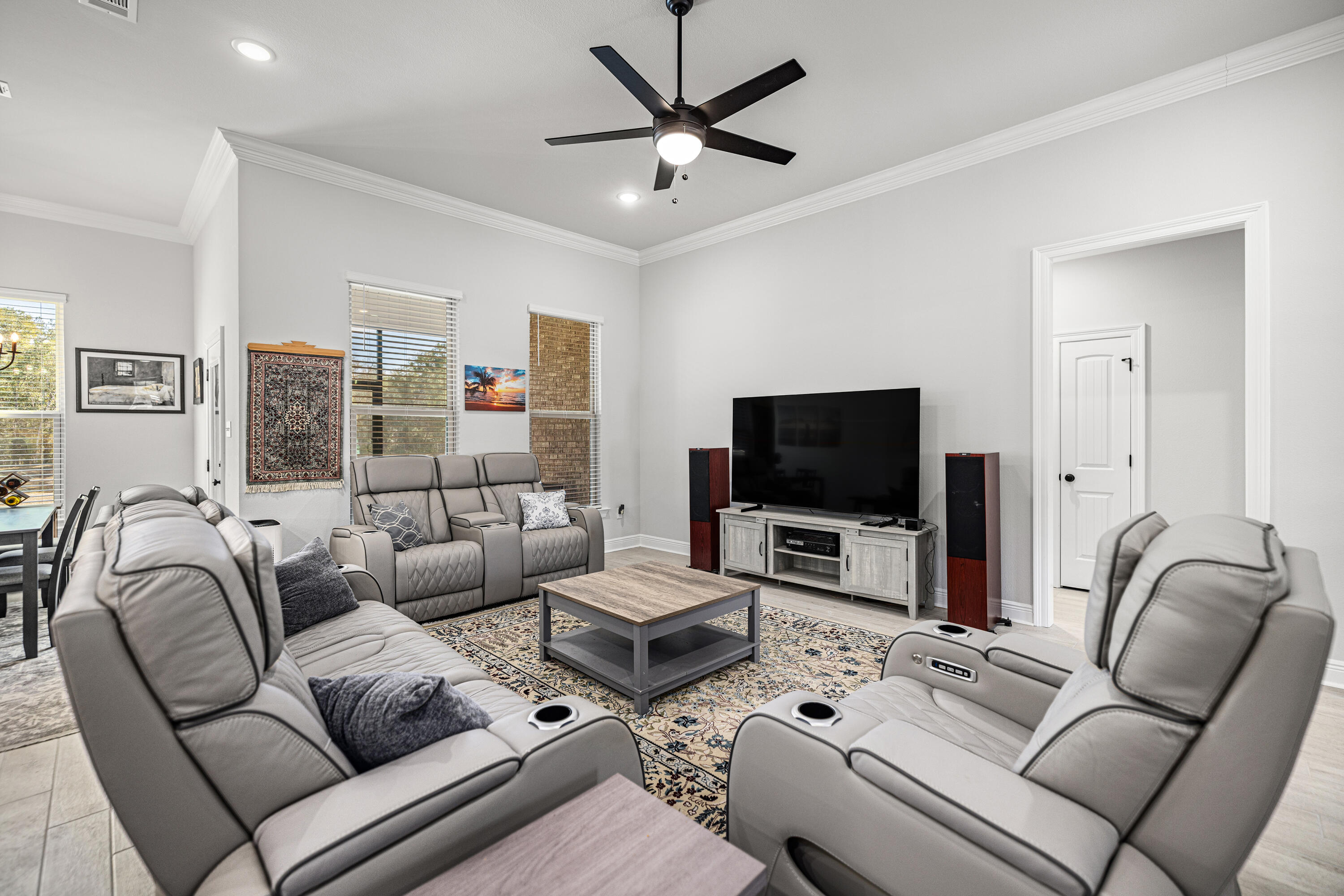 132 East Tweet Street Freeport, FL 32439 - Photo 11 of 79 a living room with furniture and a flat screen tv