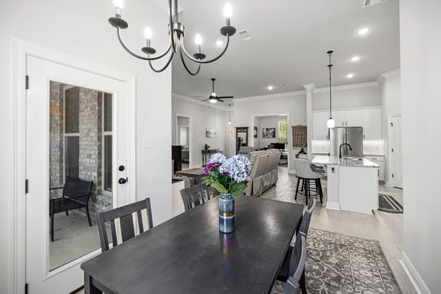 a bathroom with a granite countertop sink toilet and a mirror