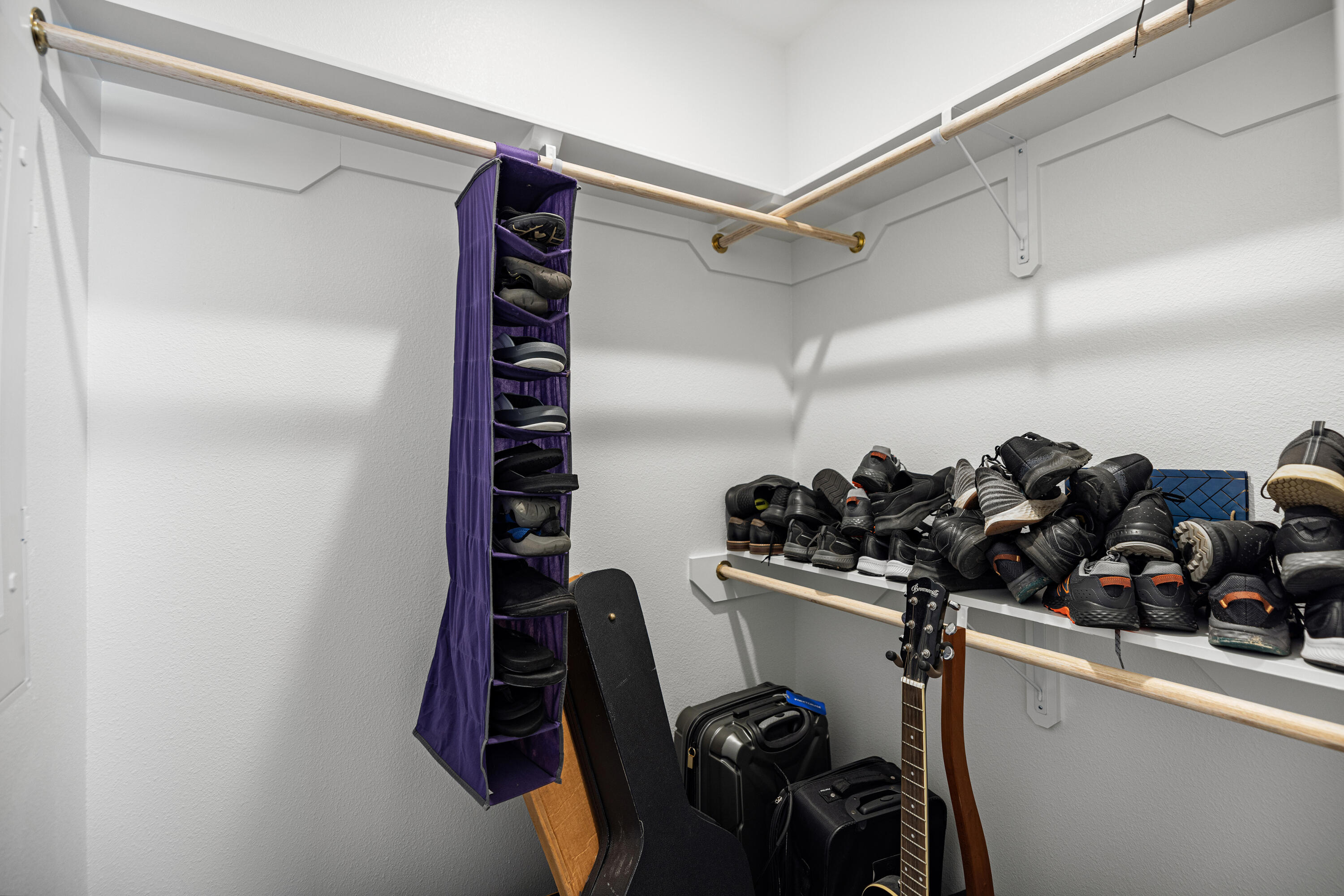 132 East Tweet Street Freeport, FL 32439 - Photo 25 of 79 a view of walk in closet with clothes and shoes