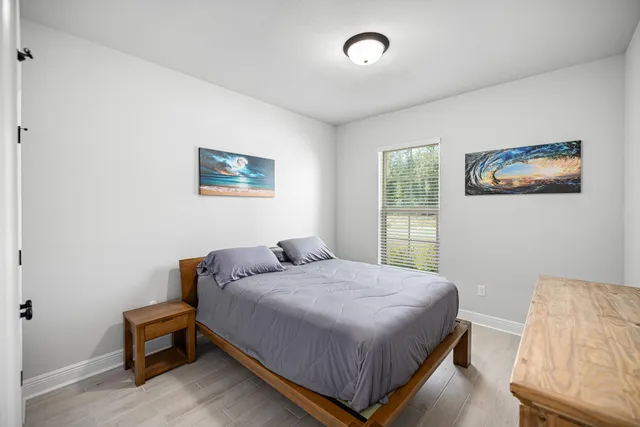 a view of a lake with houses in the background