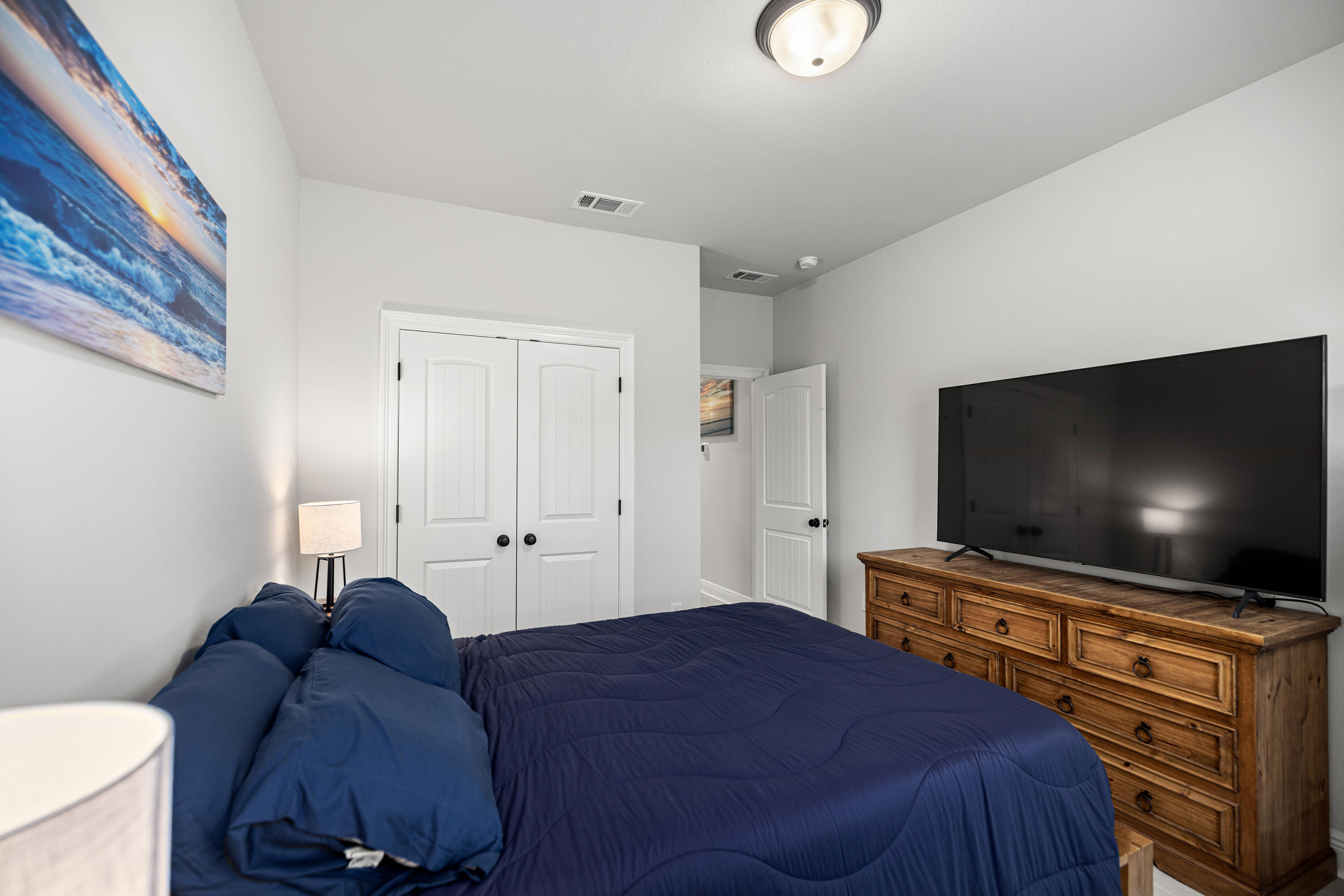 132 East Tweet Street Freeport, FL 32439 - Photo 31 of 79 a living room with furniture and a flat screen tv