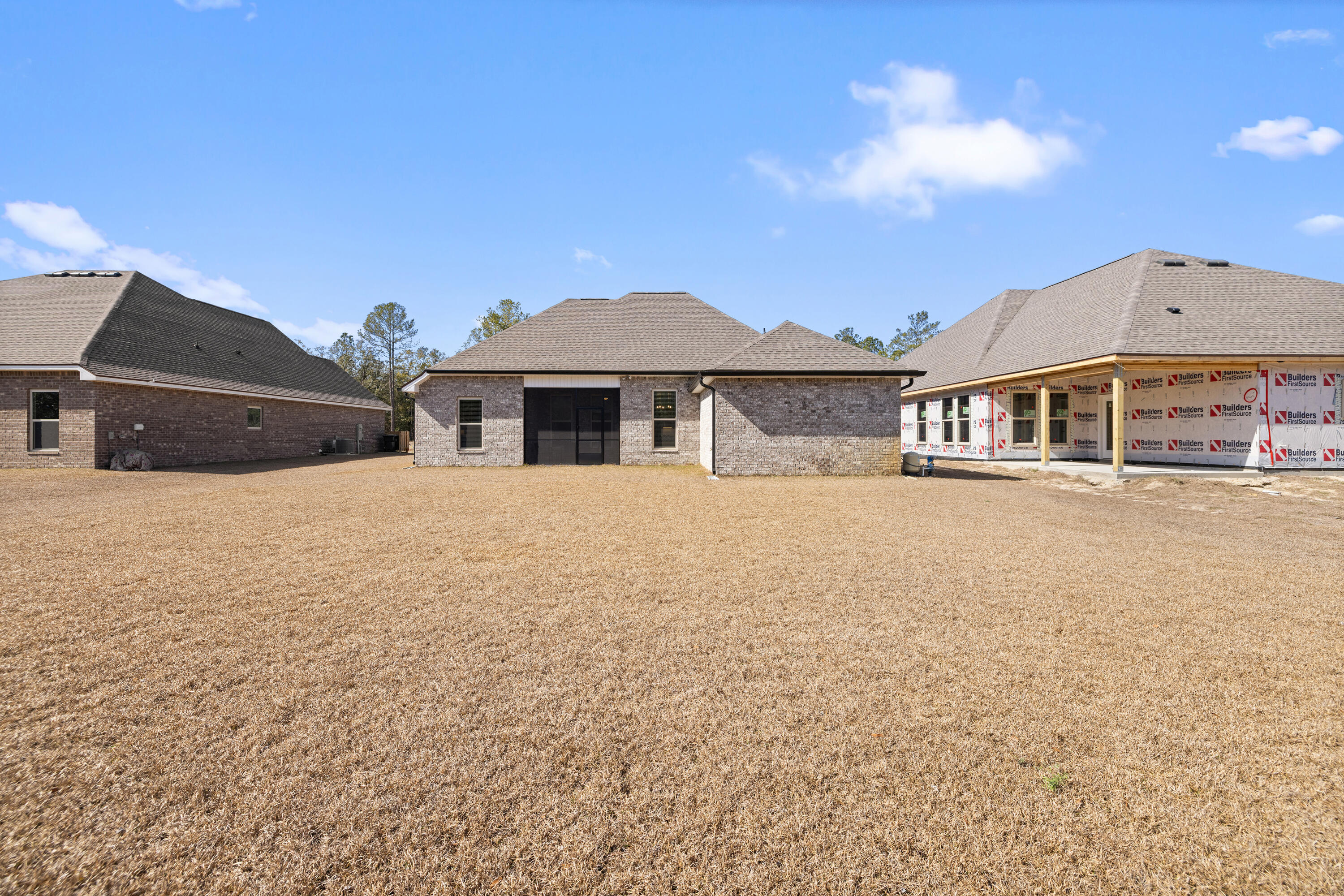 132 East Tweet Street Freeport, FL 32439 - Photo 37 of 79 a front view of a house with a yard