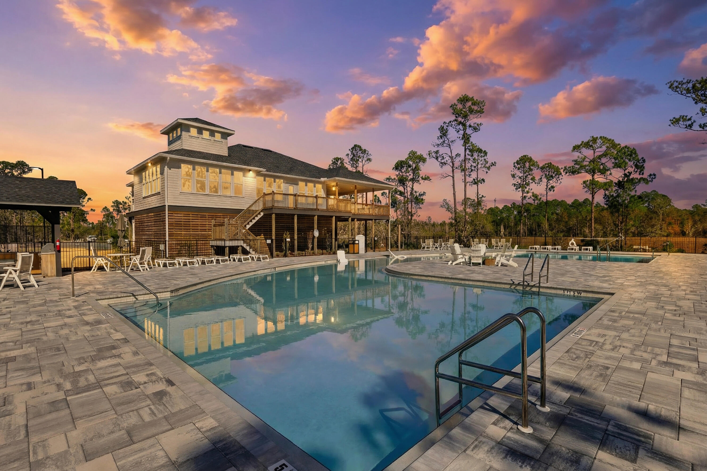132 East Tweet Street Freeport, FL 32439 - Photo 56 of 79 a view of a swimming pool with outdoor seating