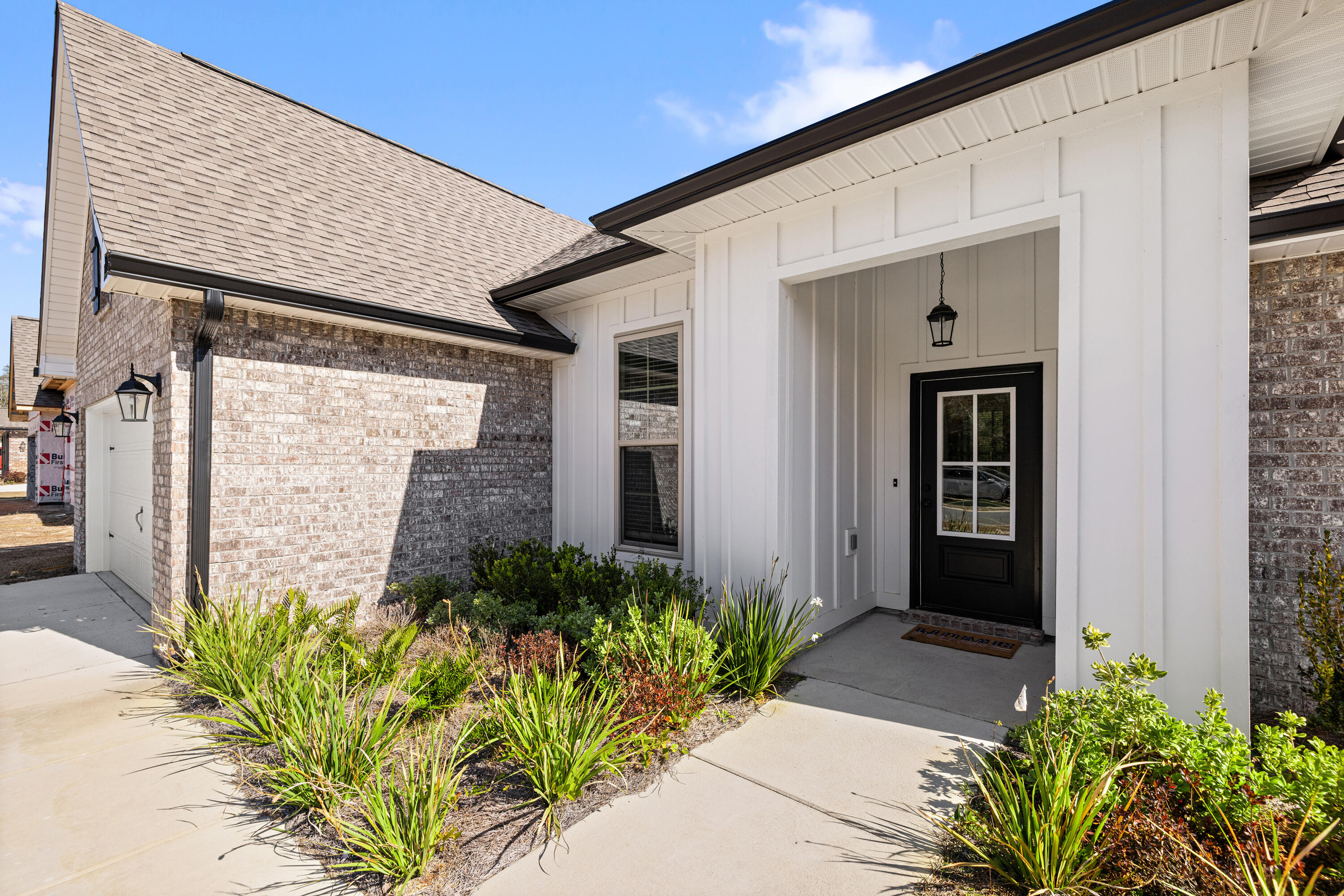 132 East Tweet Street Freeport, FL 32439 - Photo 6 of 79 a front view of a house with a yard