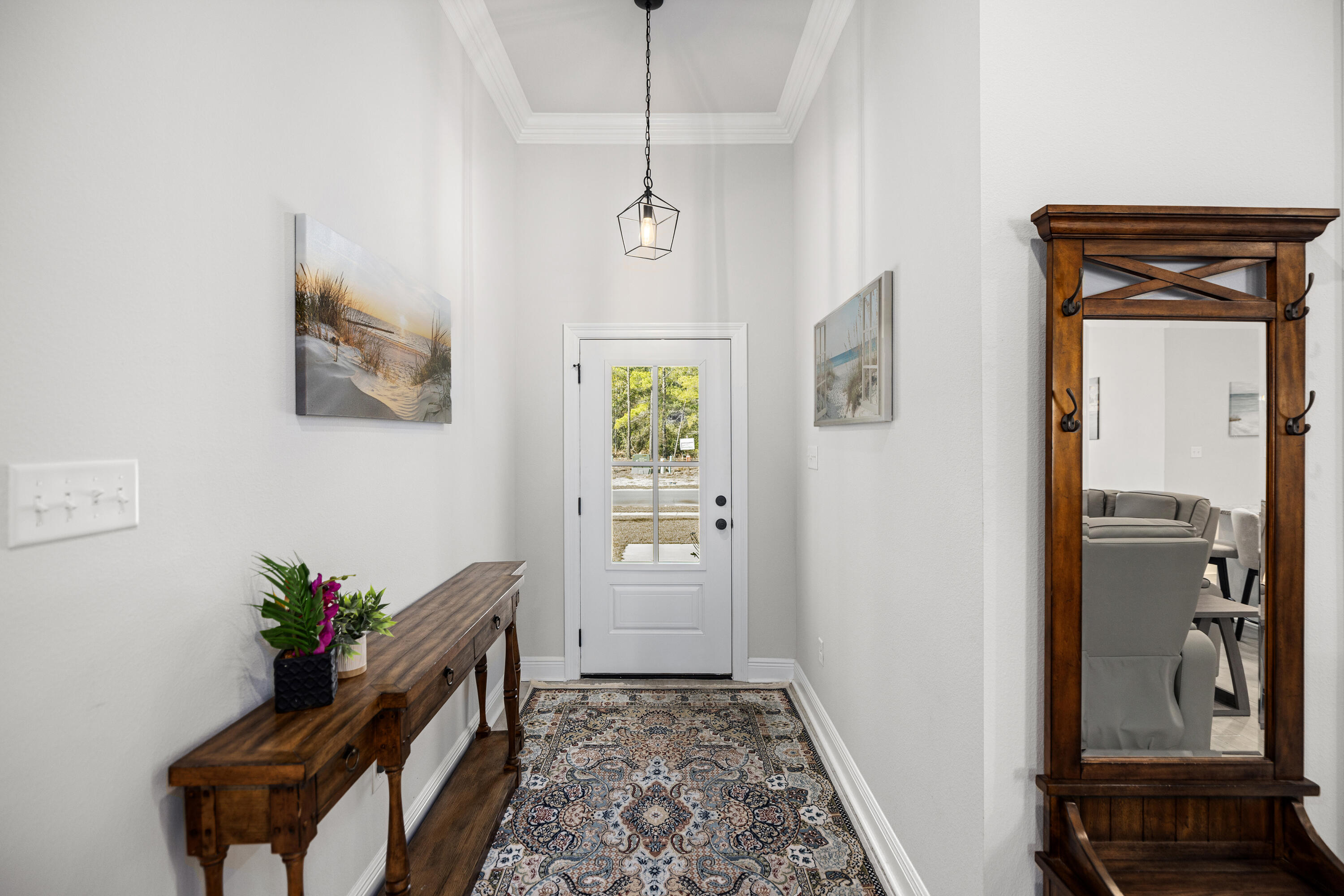 132 East Tweet Street Freeport, FL 32439 - Photo 8 of 79 a living room with furniture and a potted plant