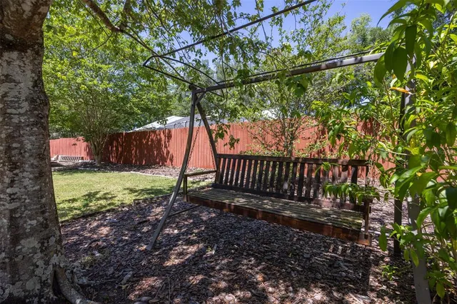 a view of a backyard with a small cabin