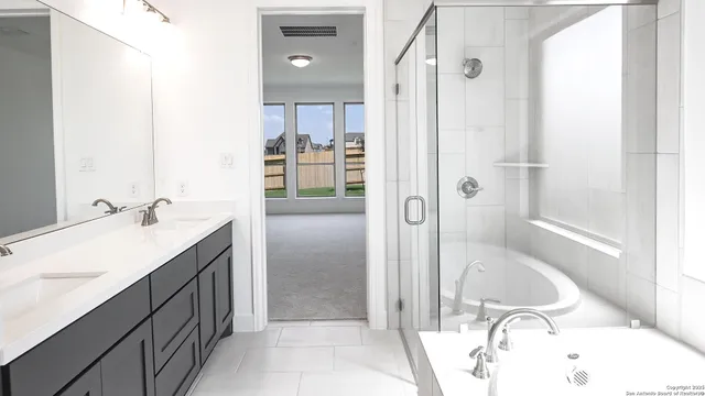 a view of a kitchen with wooden floor and electronic appliances