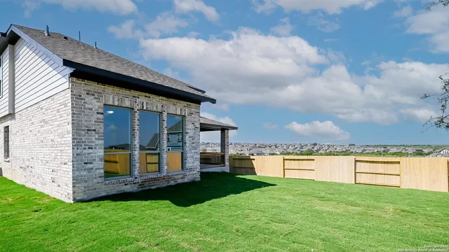 a view of balcony with furniture