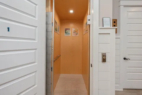 a bathroom with a toilet and shower