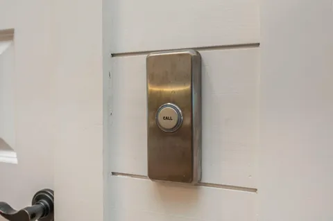 a view of a balcony with a floor to ceiling window