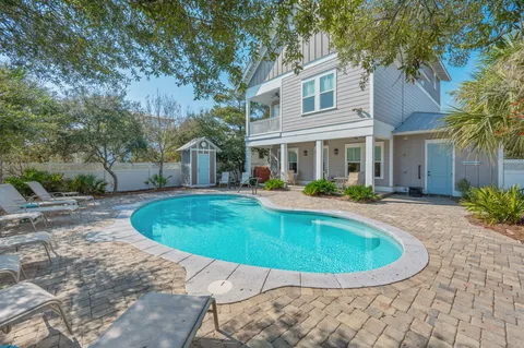 a view of a house with swimming pool