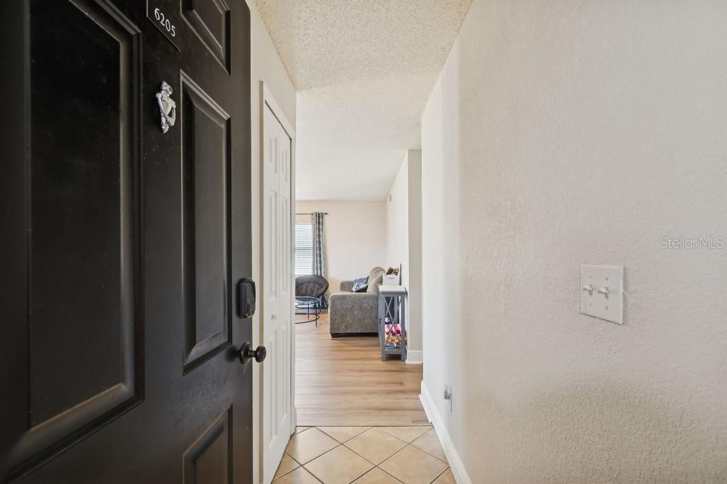 13125 Wilcox Road, Unit 6205 Largo, FL 33774 - Photo 4 of 48 a view of a hallway with living room
