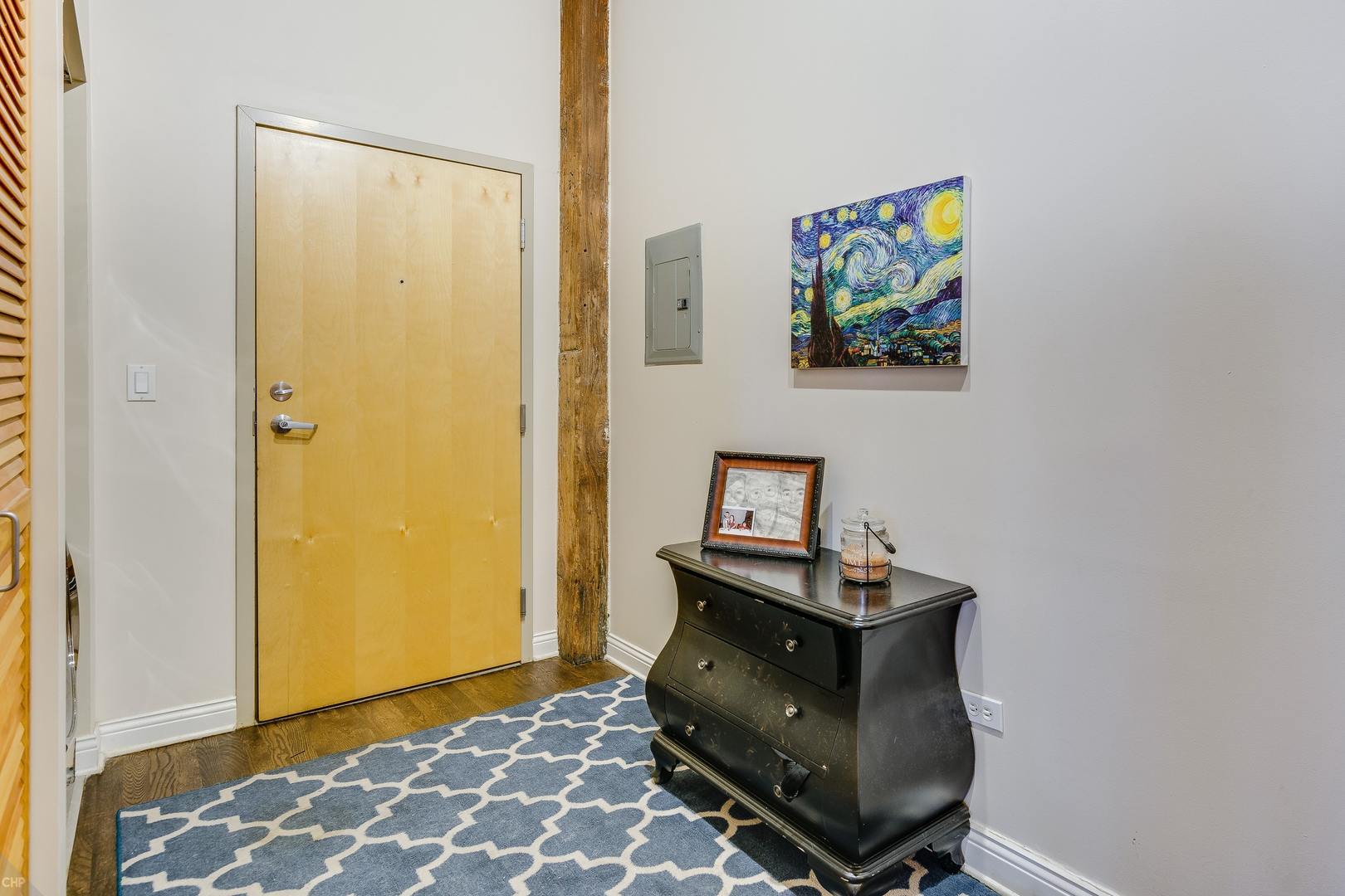 1500 West Monroe Street, Unit 122 Chicago, IL 60607 - Photo 2 of 14 a living room with furniture