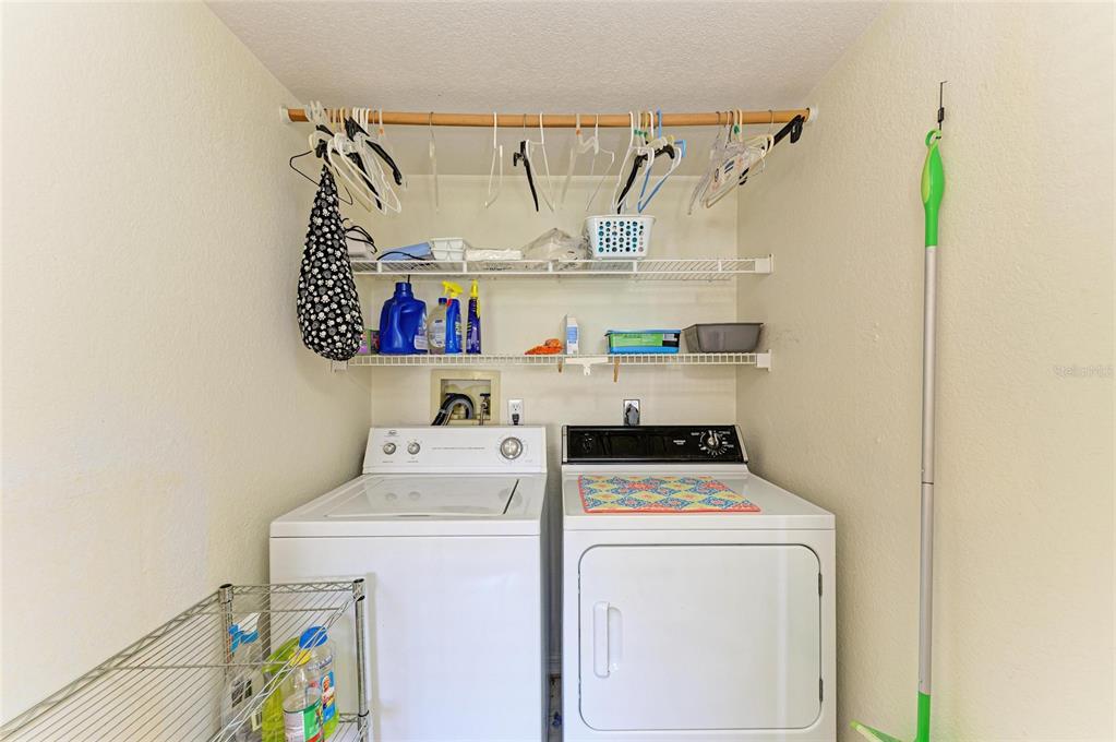 175 Kings Highway, Unit 1114 Punta Gorda, FL 33983 - Photo 33 of 64 a utility room with dryer and washer