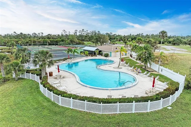 a view of a lake with a yard