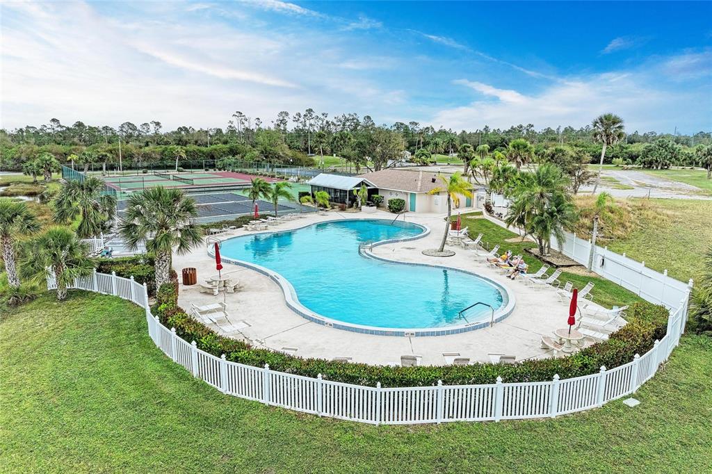 175 Kings Highway, Unit 1114 Punta Gorda, FL 33983 - Photo 40 of 64 a view of a swimming pool with a lake from a balcony