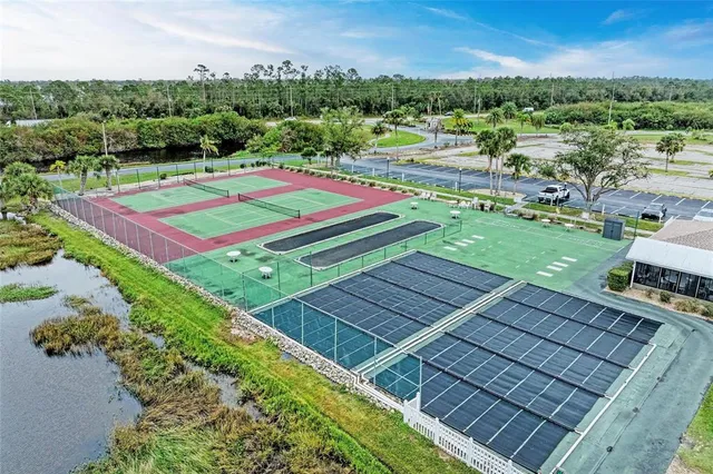 a view of a building with a yard