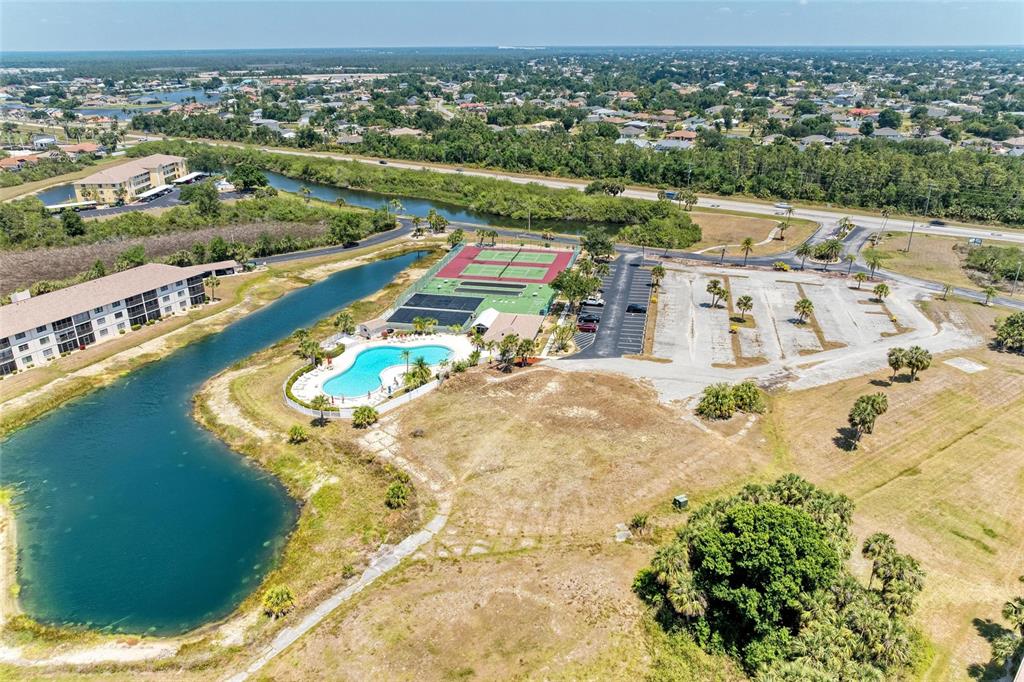 175 Kings Highway, Unit 1114 Punta Gorda, FL 33983 - Photo 59 of 64 an aerial view of residential houses with outdoor space