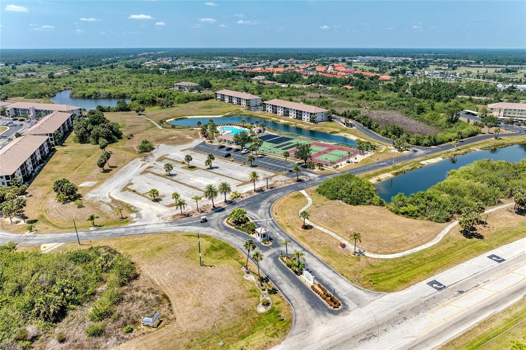 175 Kings Highway, Unit 1114 Punta Gorda, FL 33983 - Photo 61 of 64 an aerial view of residential houses with outdoor space