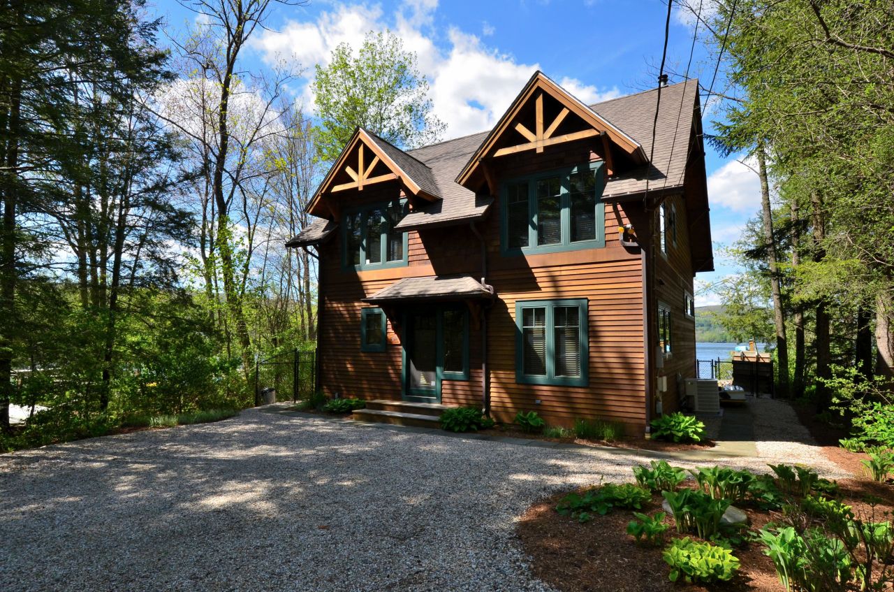 a front view of house with a yard