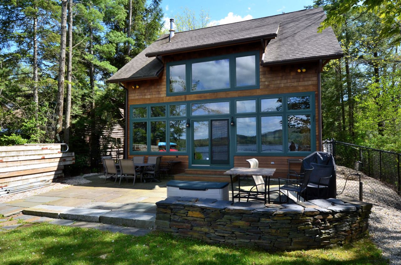 16 Grove Road Stockbridge, MA 01262 - Photo 2 of 13 a house view with a sitting space fire pit and outdoor space