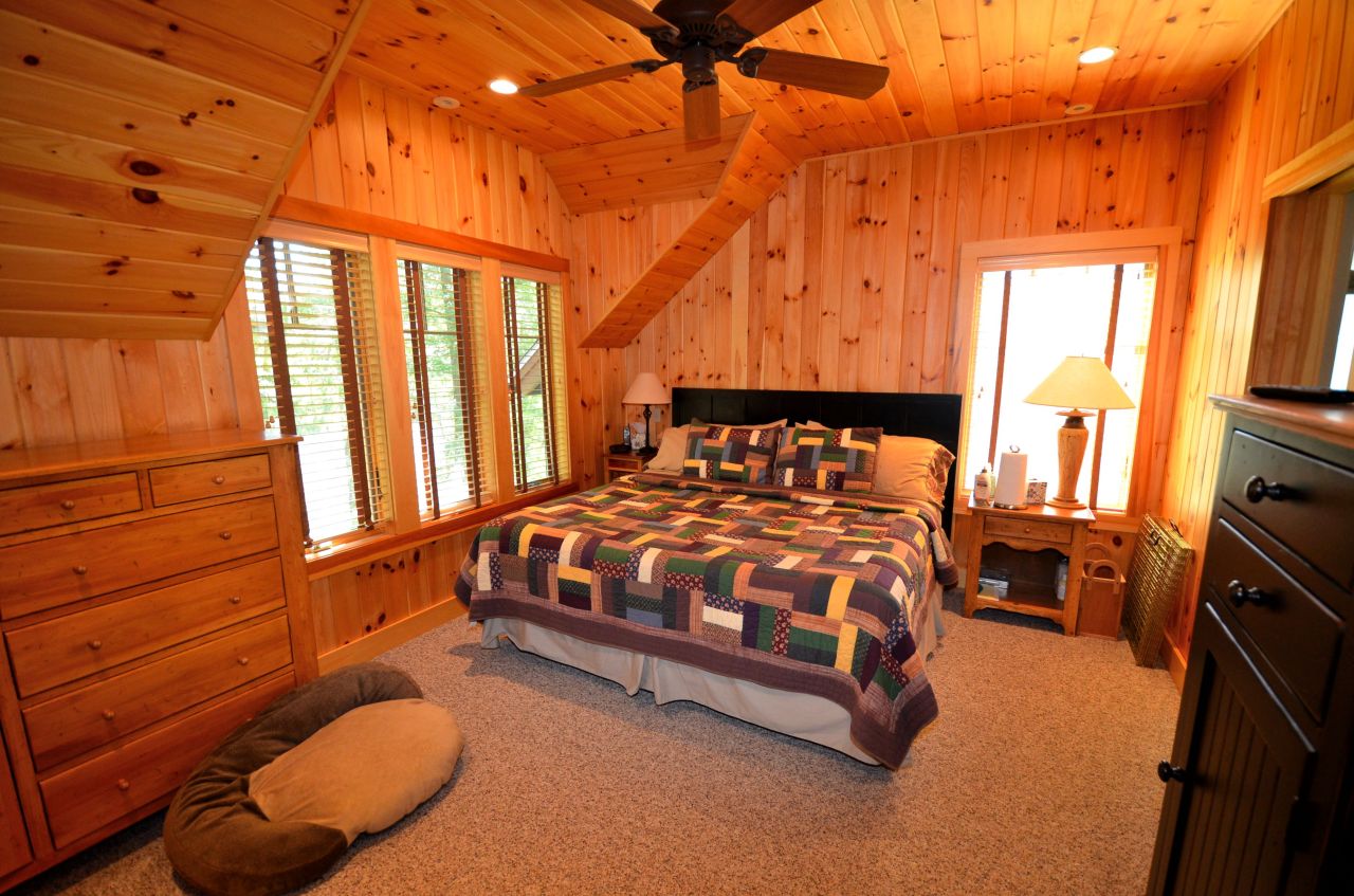 16 Grove Road Stockbridge, MA 01262 - Photo 11 of 13 a bedroom with a bed and wooden floor