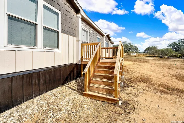 a house with trees in the background
