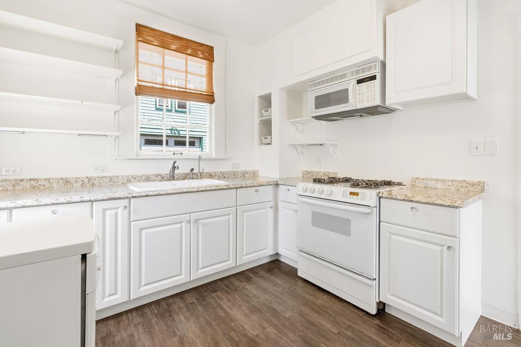411 Main Street Sausalito, CA 94965 - Photo 9 of 33 Kitchen is bright with a sun porch area off the back of Kitchen