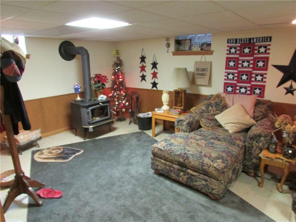 6846 Wall Road Monongahela, PA 15063 - Photo 22 of 25 Spacious game room with wood burning stove