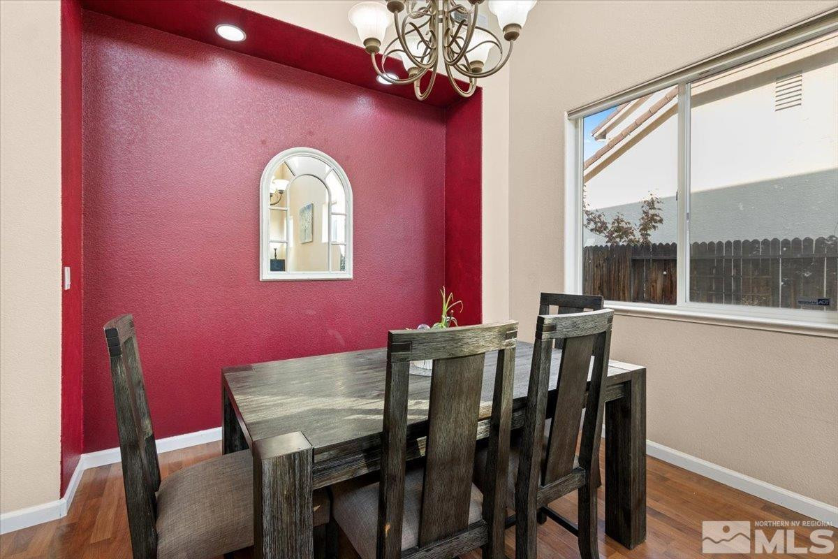 2540 Perryville Drive Reno, NV 89521 - Photo 8 of 27 a view of a dining room with furniture window and outside view