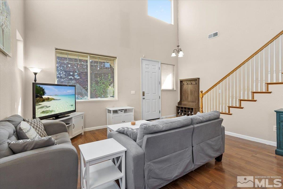 2540 Perryville Drive Reno, NV 89521 - Photo 10 of 27 a living room with furniture and a flat screen tv