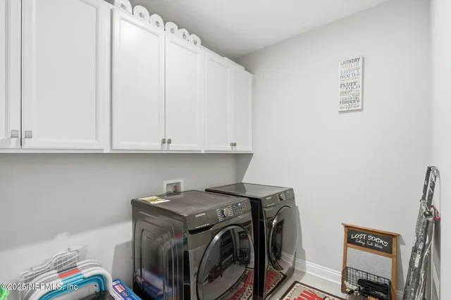 a building outdoor space with patio furniture and garden