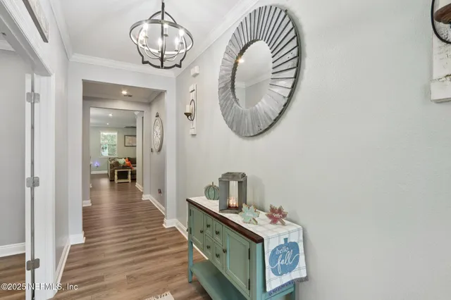 a large kitchen with stainless steel appliances kitchen island granite countertop a large center island a stove a sink a dining table and chairs