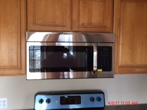 103 Gore Road Webster, MA 01570 - Photo 5 of 24 a kitchen with a sink and cabinets
