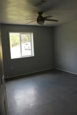 a view of a golf course with a lake