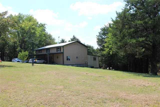 a house with trees in front of it
