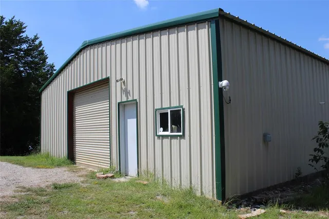 a view of a yard with an outdoor space