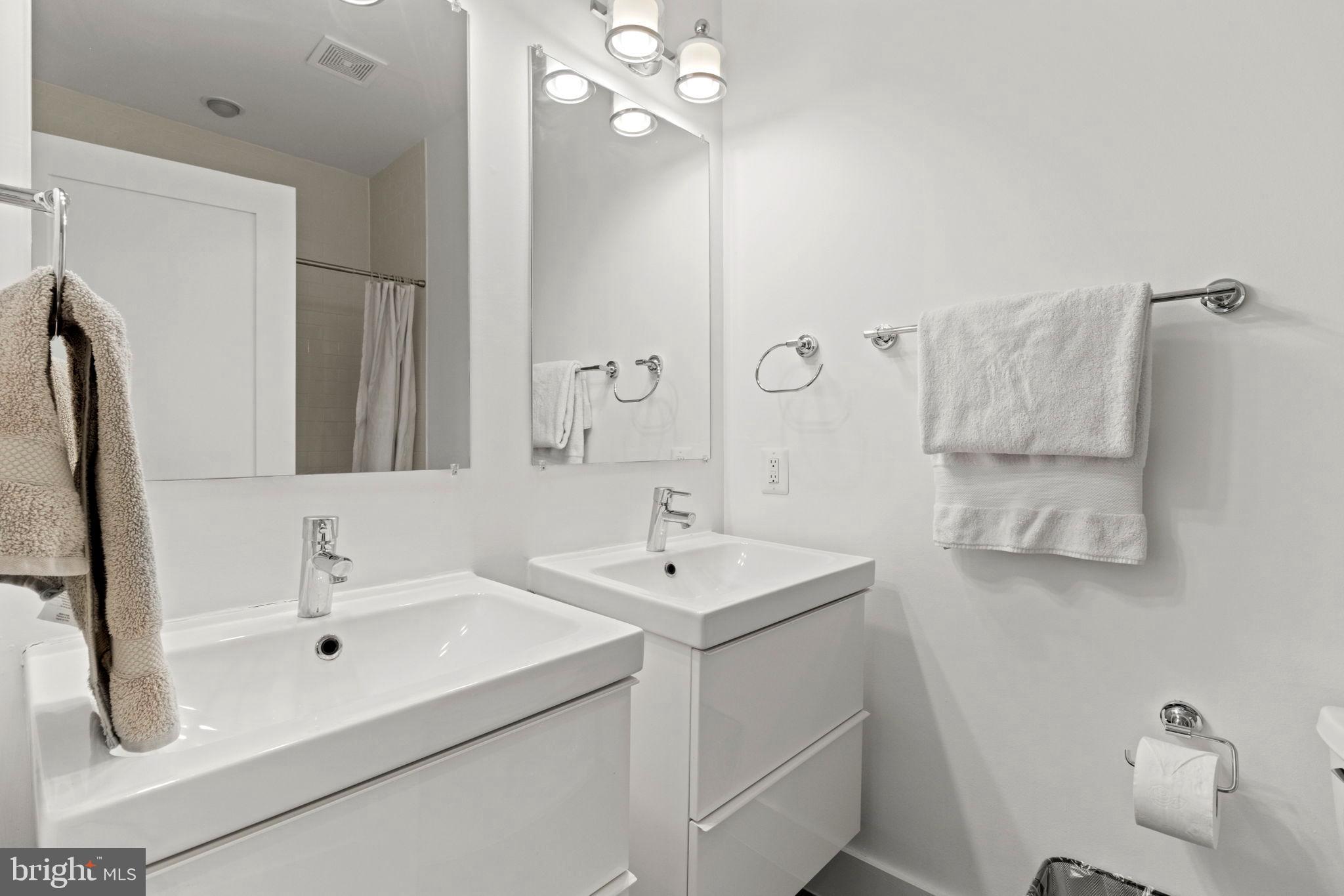 1928 First Street Northeast Washington, DC 20002 - Photo 14 of 26 a bathroom with a sink and a mirror