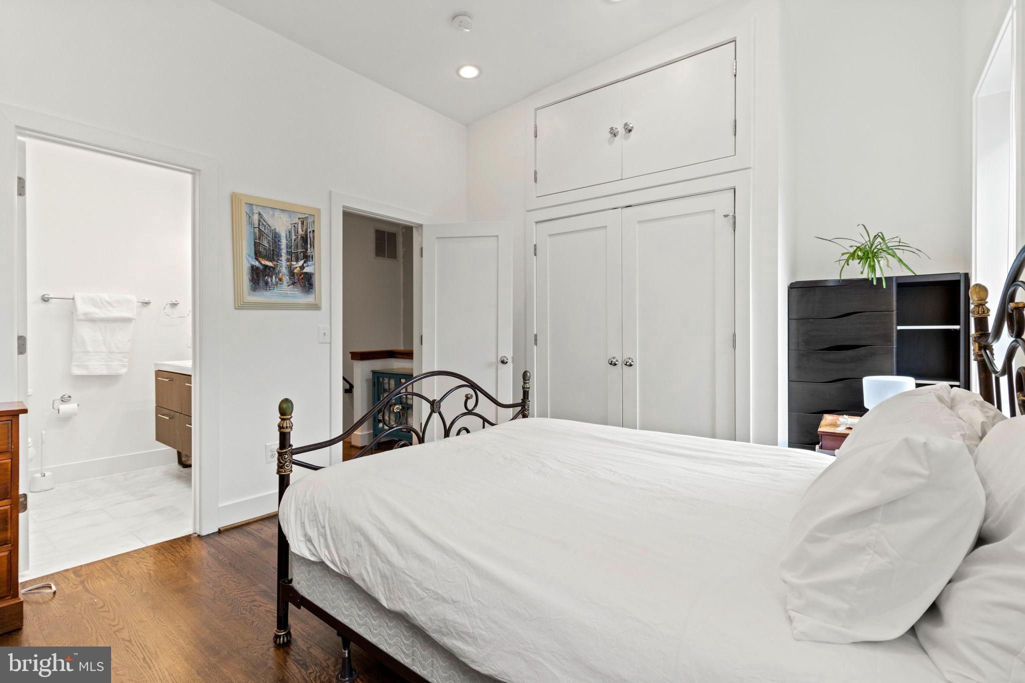 1928 First Street Northeast Washington, DC 20002 - Photo 18 of 26 a bedroom with a bed and a dresser