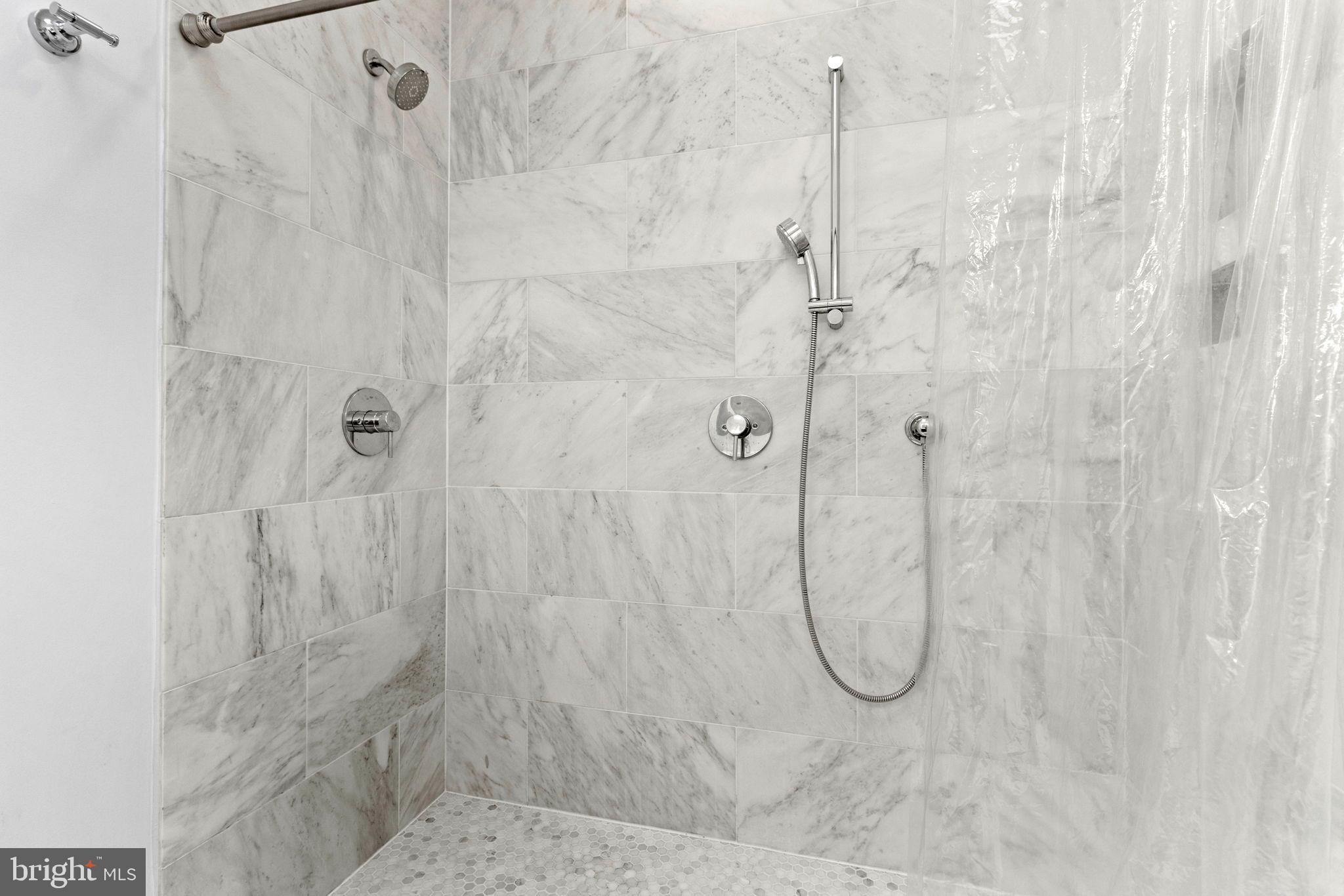 1928 First Street Northeast Washington, DC 20002 - Photo 20 of 26 a bathroom with a bath shower