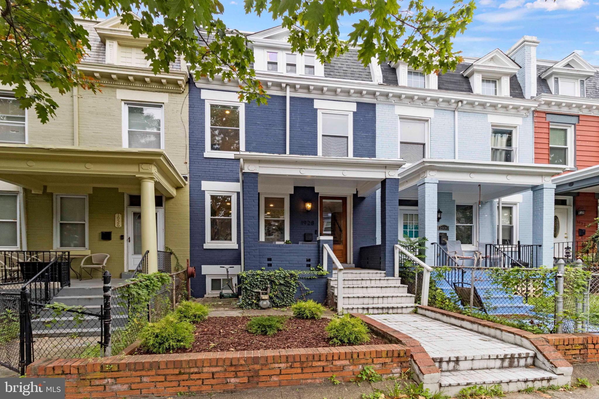 1928 First Street Northeast Washington, DC 20002 - Photo 2 of 26 front view of a building with a yard