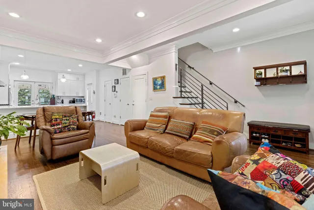 a living room with furniture and a couch